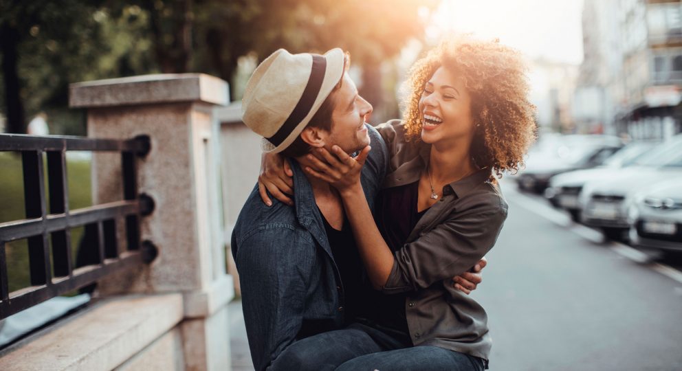 How to Bring Heartfulness into Your Marriage. Image of couple with woman holding man's face and smiling broadly.