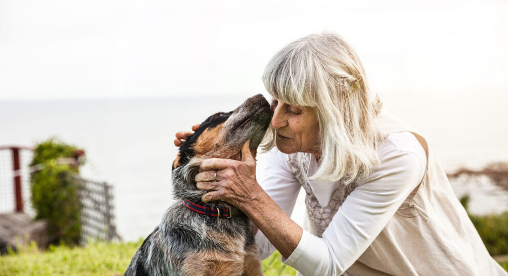 Meta-Emotion: How You Feel About Feelings. Image of happy woman with her dog.