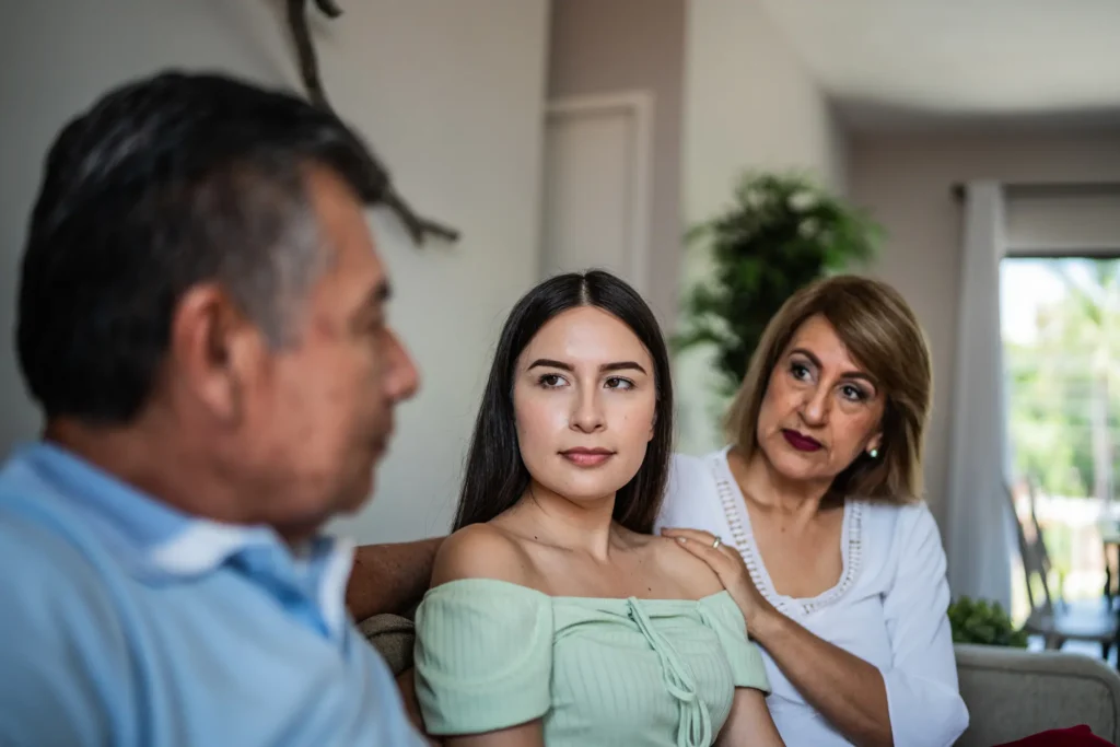 Adult woman managing family expectations with good boundaries and open communication.