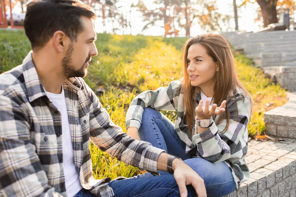 Couple on a date having deep conversation to enhance emotional intimacy.