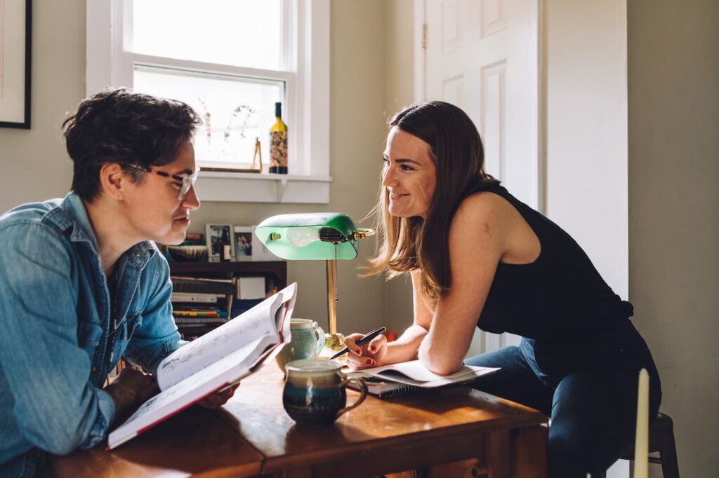 Young couple living together maintaining individuality in shared space.