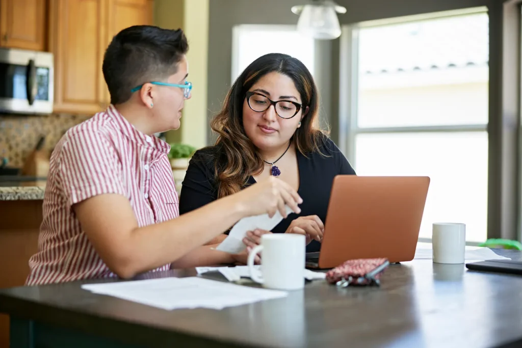 Couple combining finances and responsibilities after moving in together