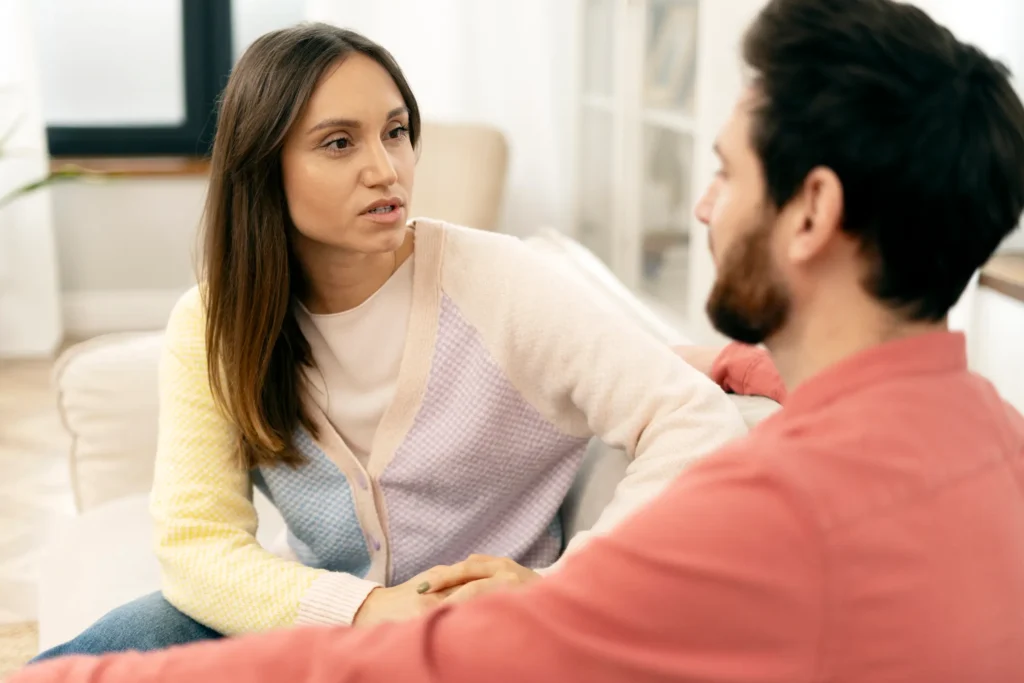 A couple engaging in healthy communication to improve their relationship.