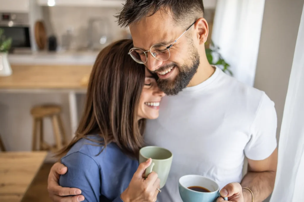 A couple embracing, sharing an emotional connection.